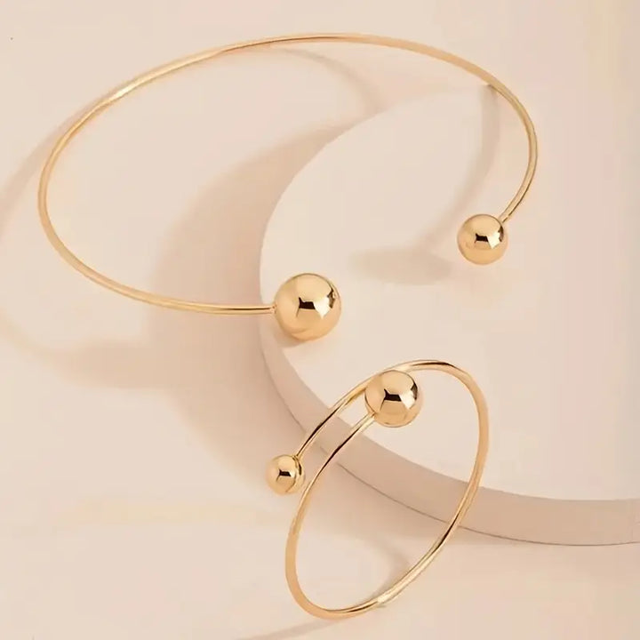 Minimalistyczny zestaw naszyjnika typu collar i bransoletki cuff | Złoty