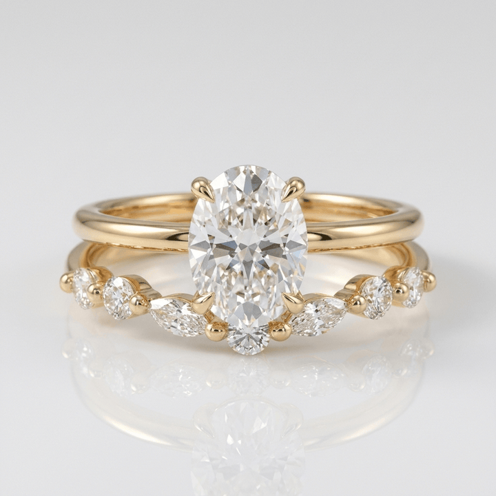 Elegancki zestaw złotych obrączek z diamentami w kształcie owalnym i w szlifie marquise