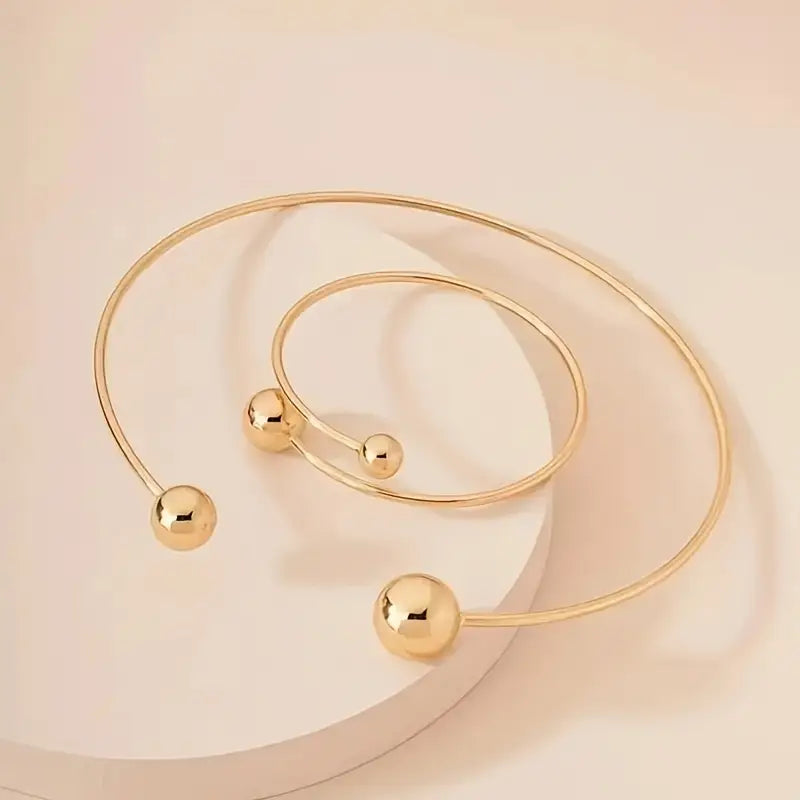 Minimalistyczny zestaw naszyjnika typu collar i bransoletki cuff | Złoty