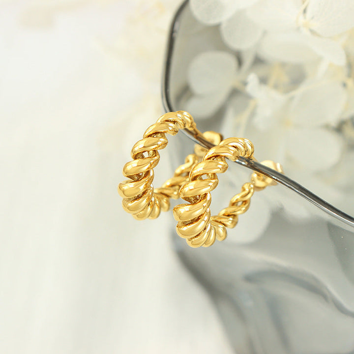 Kolczyki złote Aurum Gold o skręcanym wzorze – eleganckie i ponadczasowe