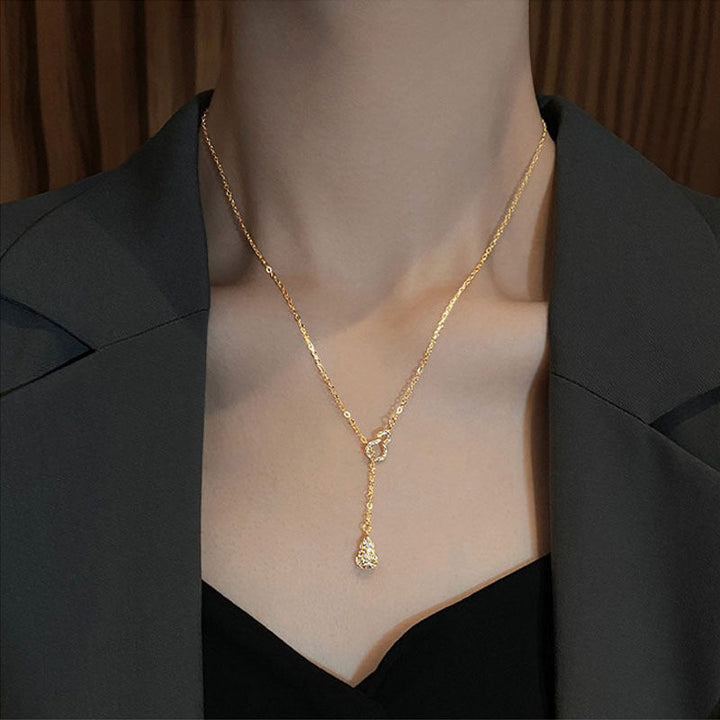 Hana Naszyjnik z frędzlą w kolorze złota - Elegancka biżuteria z frędzlą w kolorze złotym